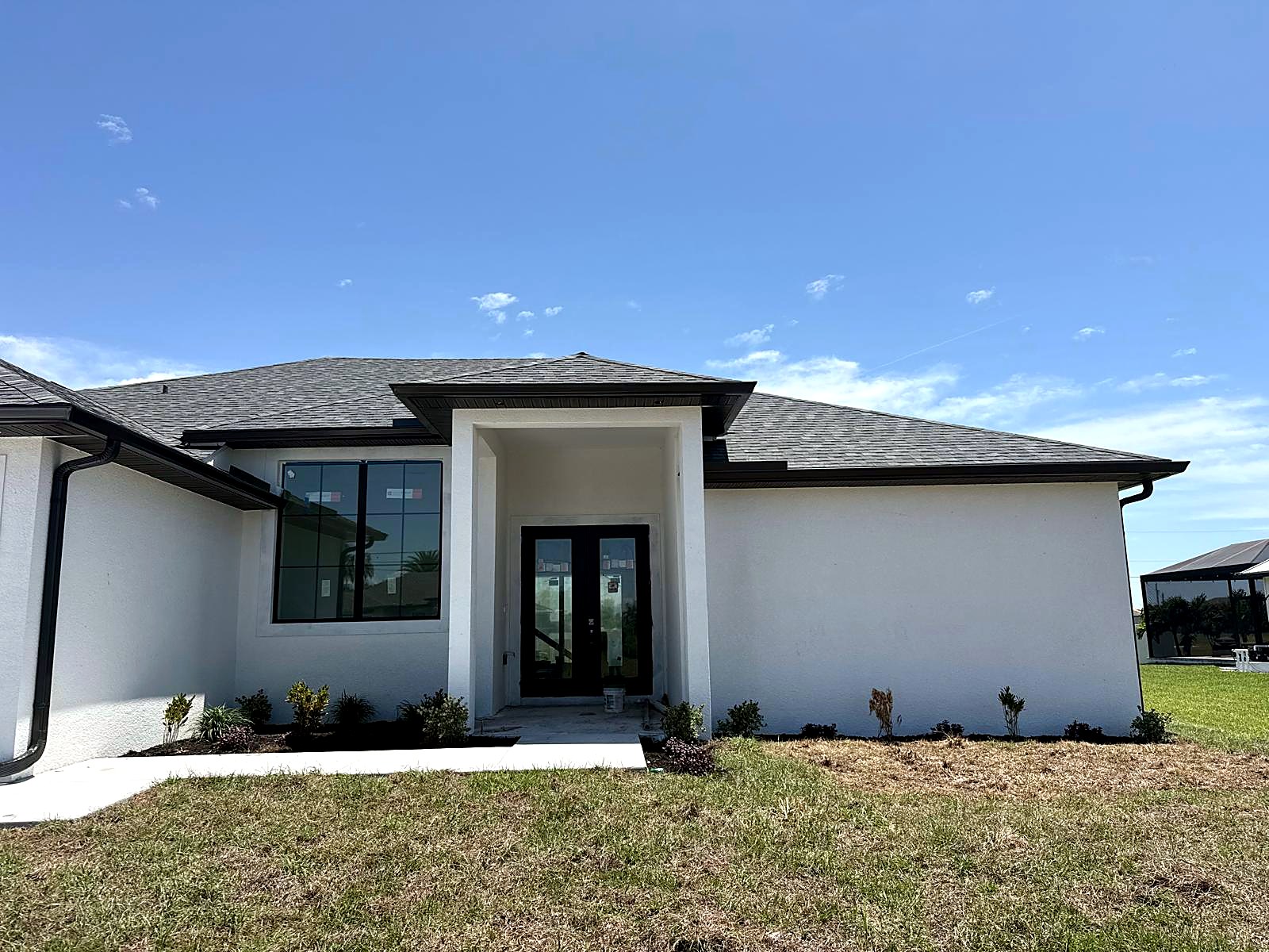 New gutter install on home entry, North Port FL